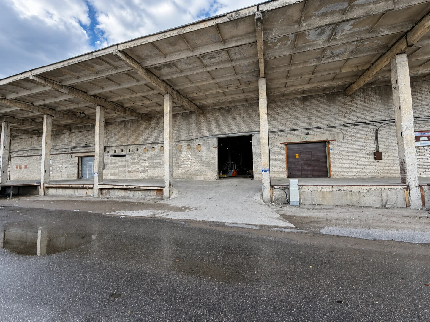 Exterior of EcoTrip’s future base and covered loading area on Sandėlių Street, Klaipėda.